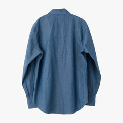 Back view highlighting the western back yoke, smooth stitching, and natural drape of the Sax chambray fabric.