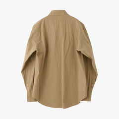 Back view highlighting the western back yoke, clean stitching, and structured drape of the beige typewriter cloth.