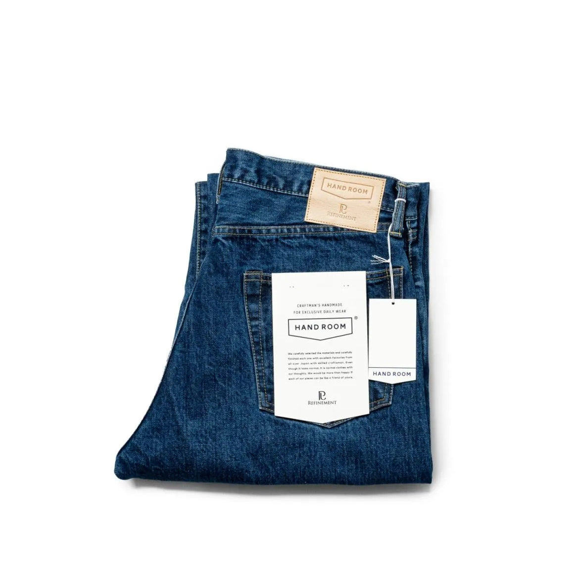 Folded view of the Hand Room Exclusive for Refinement Wide Fit Mid Washed jeans