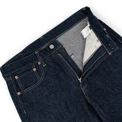 Close-up of the waistband button on the Hand Room Exclusive for Refinement Wide Fit One Washed Indigo jeans