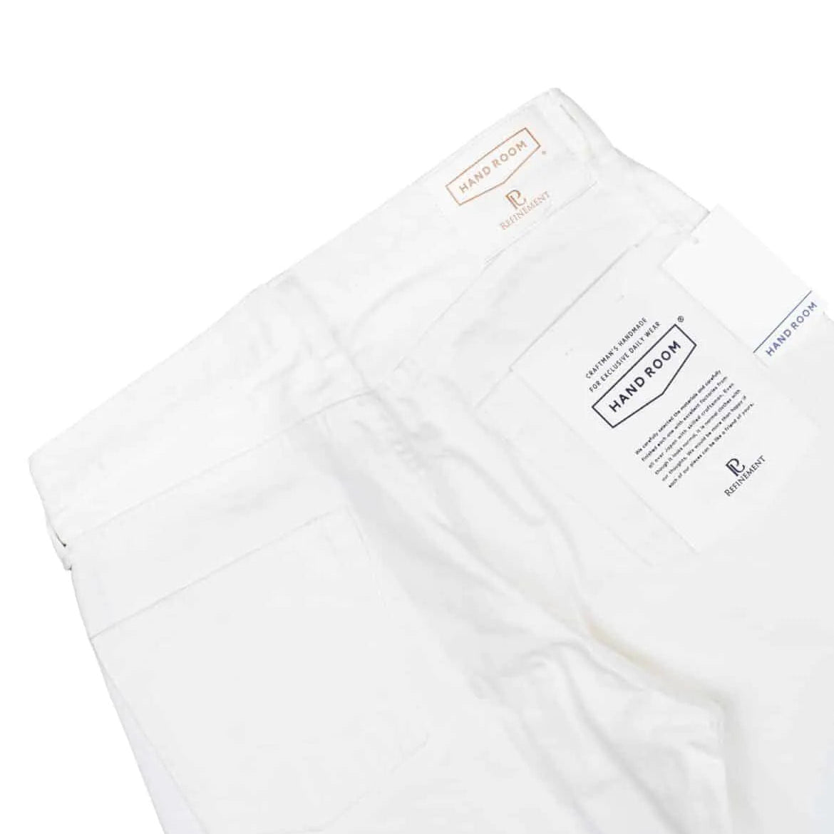 Back pocket detail of the Hand Room Exclusive for Refinement garment