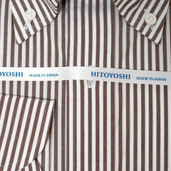 Close-up of the red stripe broadcloth fabric showing fine weave, smooth texture, and sharp stripe pattern.