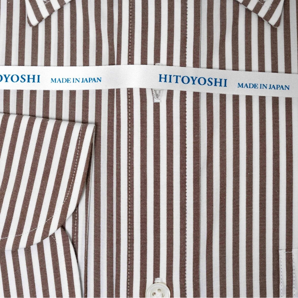 Folded front view of the Hitoyoshi Broadcloth Button Down Brown Stripe shirt