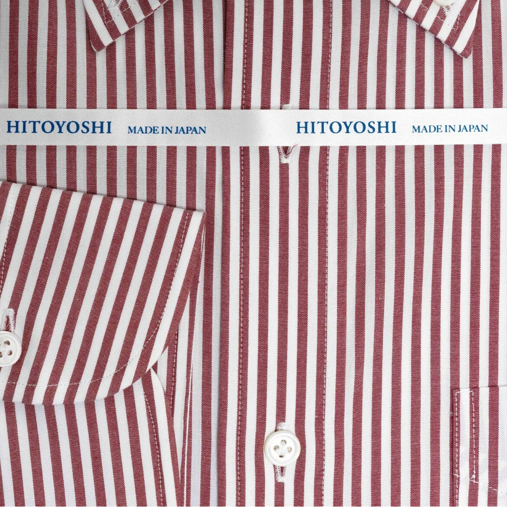 Folded front view of the Hitoyoshi Broadcloth Button Down Red Stripe shirt