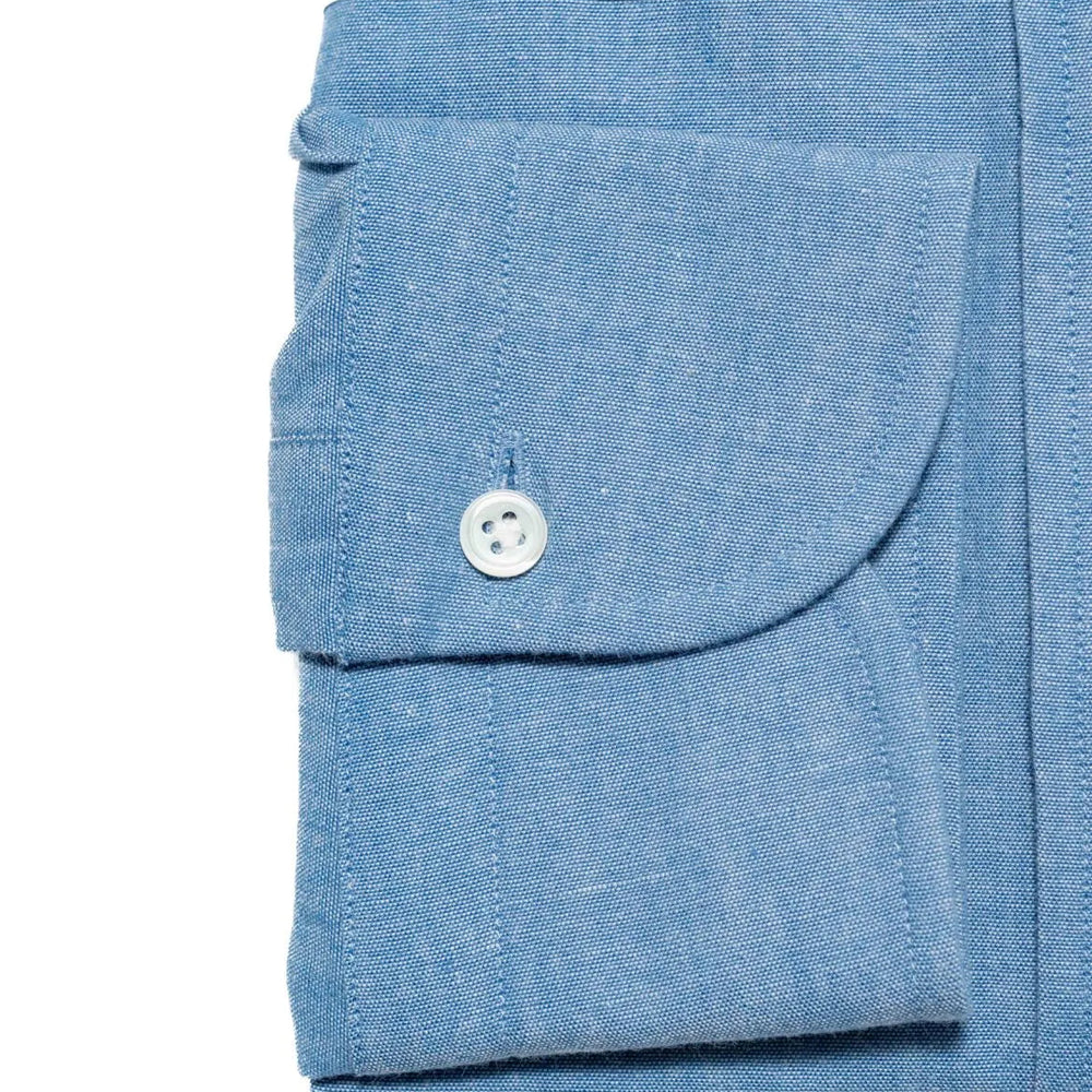 Folded sleeve button detail of the Hitoyoshi Button Down Shirt Chambray Light Blue