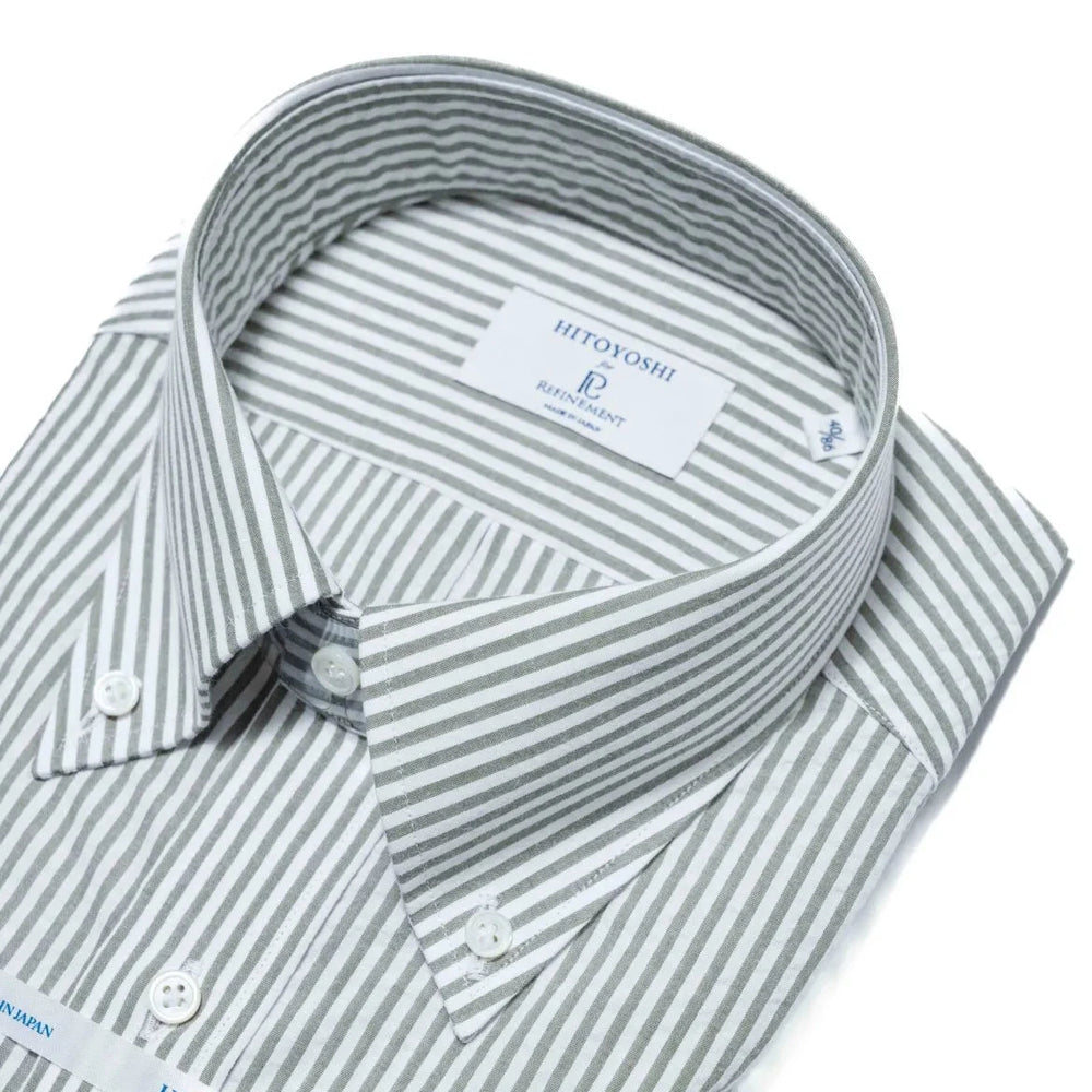 Close-up of the button-down collar showing the roll shape, stitching detail, and puckered seersucker texture.