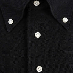 Button close-up detail of the Hitoyoshi for Refinement Button Down Polo Black