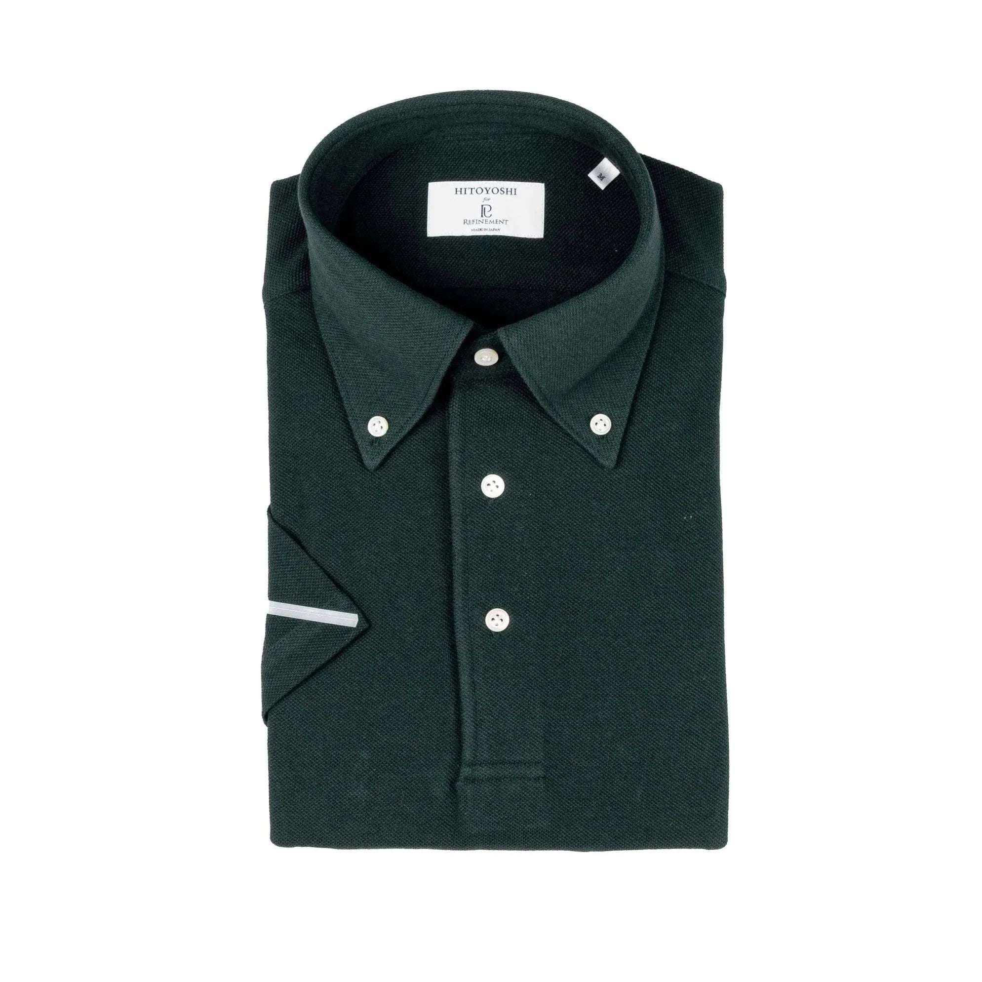 Front view of the Hitoyoshi for Refinement Button Down Polo Dark Green showing the clean silhouette, textured knit, and button-down collar.