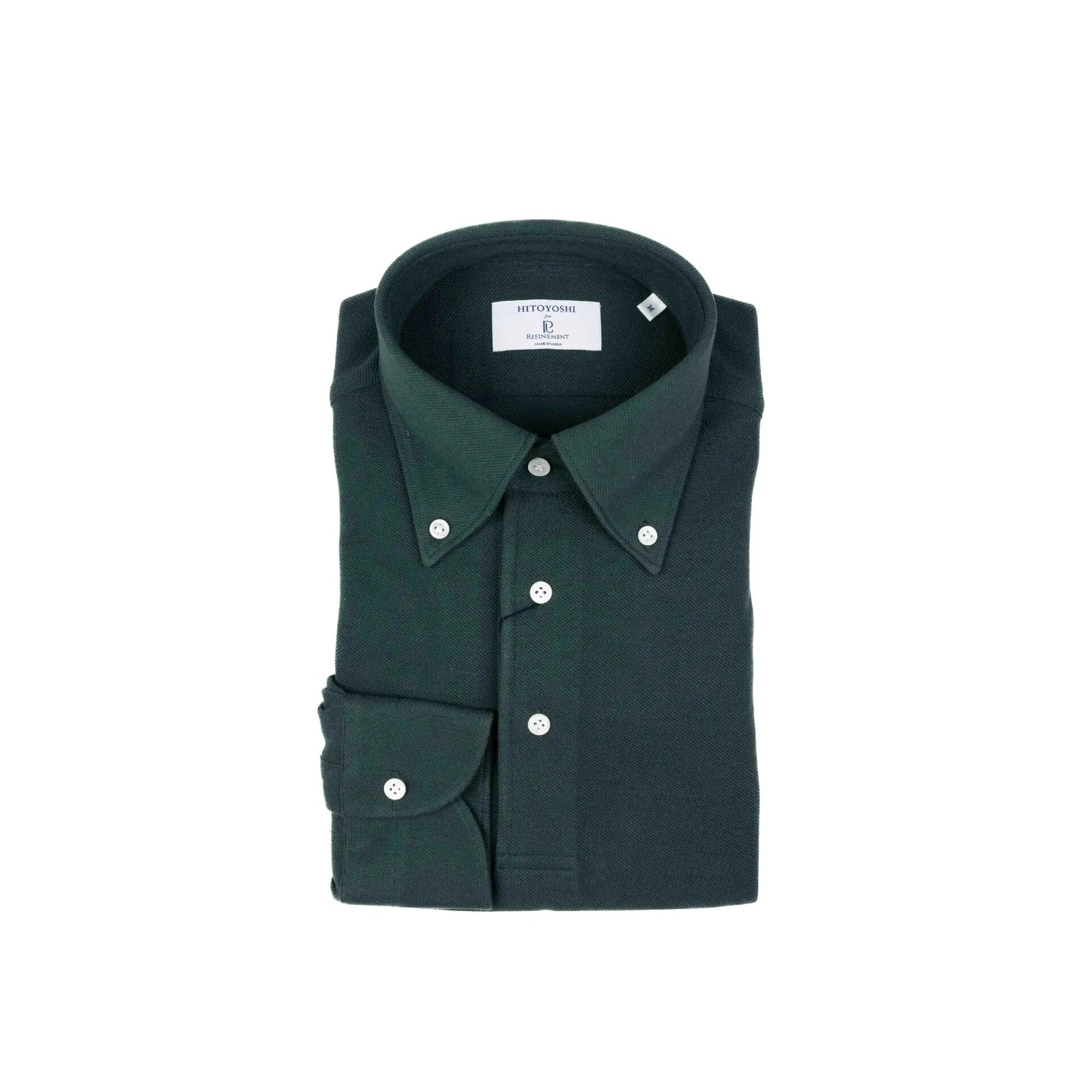 Folded view of the Hitoyoshi for Refinement Button Down Polo Long Sleeve Dark Green showing collar roll, texture, and compact folding.