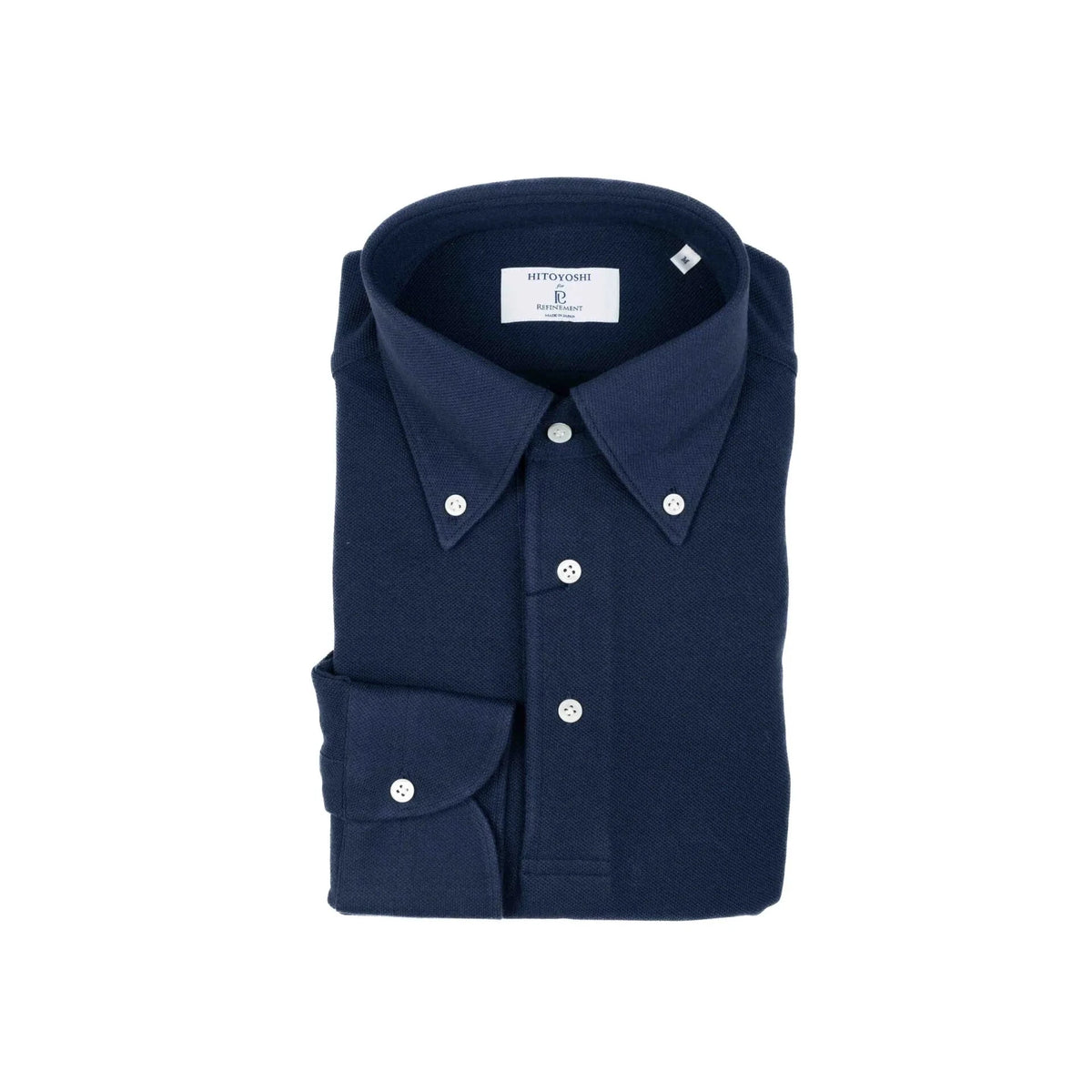 Folded view of the Hitoyoshi for Refinement Button Down Polo Long Sleeve Navy showing the collar roll, knit texture, and neat folding.