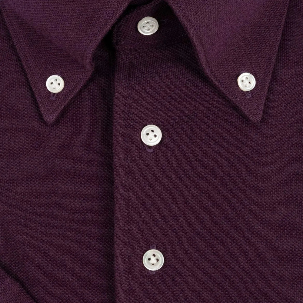 Button close-up detail of the Hitoyoshi for Refinement Button Down Polo Maroon