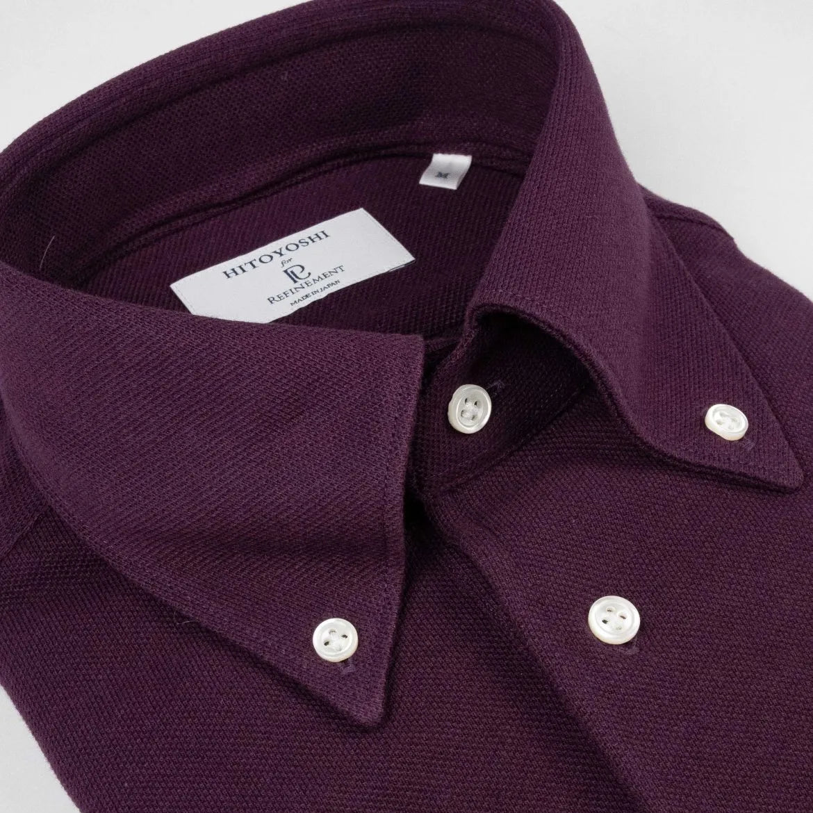Collar detail of the Hitoyoshi for Refinement Button Down Polo Maroon