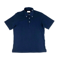 Front view of the Hitoyoshi for Refinement Button Down Polo Navy showing the structured polo silhouette, button-down collar, and deep navy knit texture.