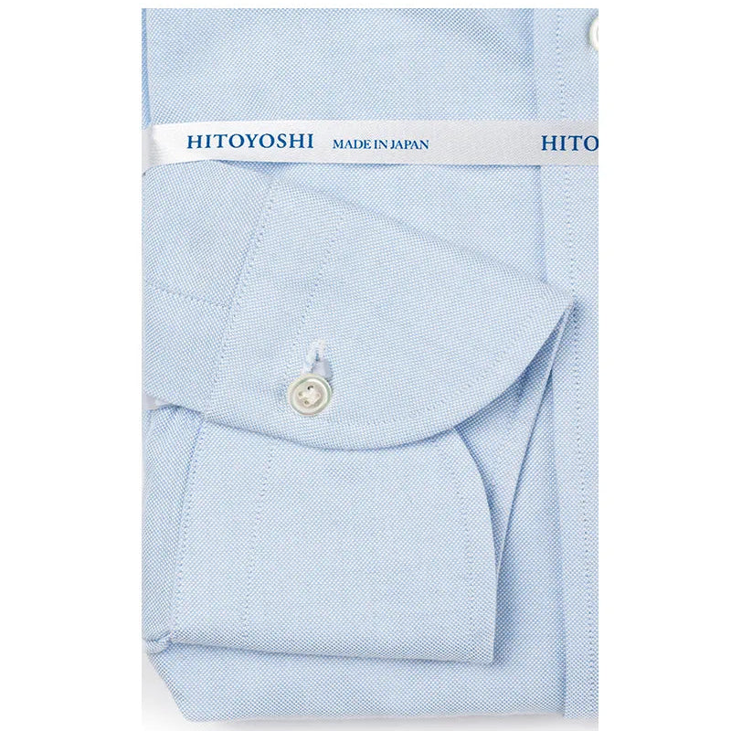 Folded sleeve button detail of the Hitoyoshi Oxford Cloth Button Down Blue shirt