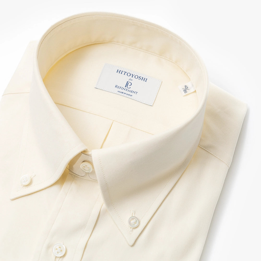 Close-up of the button-down collar showing the signature collar roll, stitching precision, and Oxford weave texture.