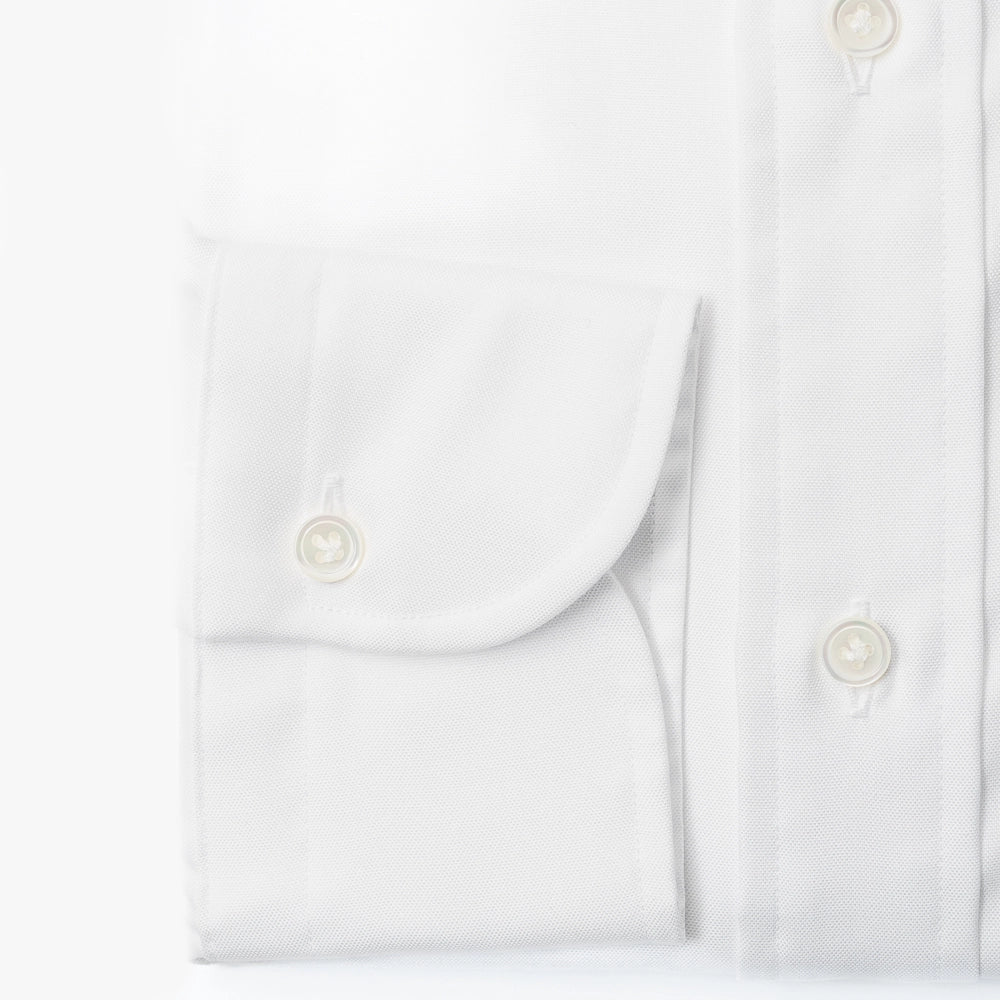 Close-up of the barrel cuff showing buttons, stitching, and clean finishing.