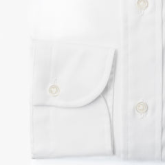 Close-up of the barrel cuff showing clean stitching, button detail, and soft-touch pinpoint weave.