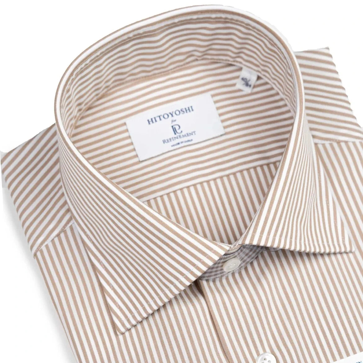 Close-up of the spread collar showing its refined shape, stitching precision, and stripe alignment.