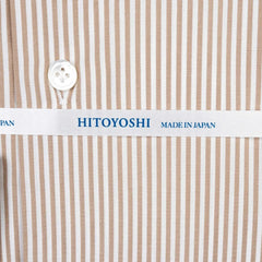 Close-up of the brown candy stripe fabric showing smooth texture, fine weave, and crisp stripe clarity.
