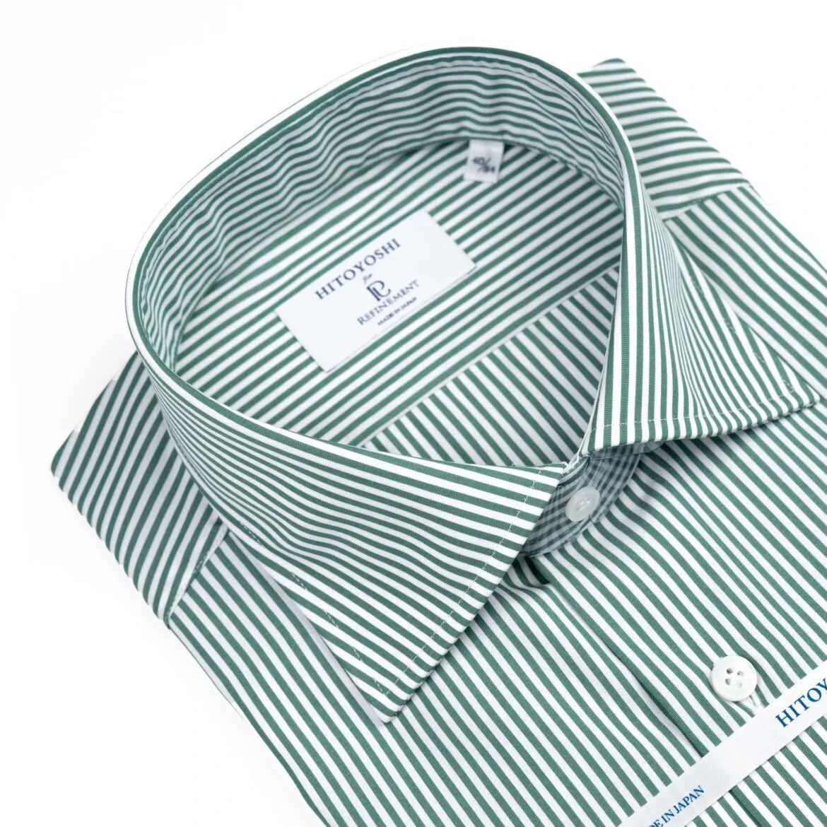 Close-up of the spread collar showing sharp collar points, stitching precision, and stripe alignment.