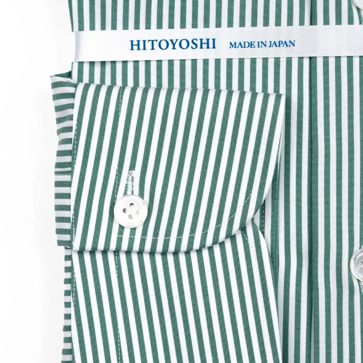 Close-up of the cuff showing button placement, stitching, and continuation of the stripe.