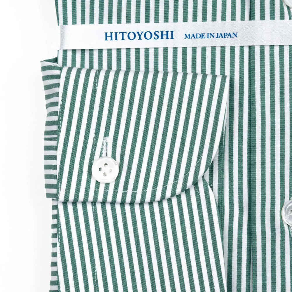 Close-up of the cuff showing button placement, stitching, and continuation of the stripe.