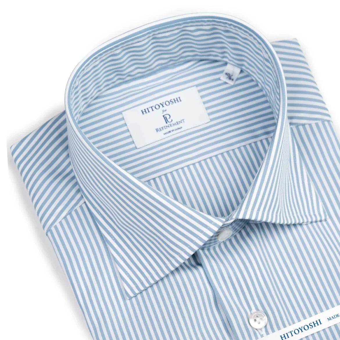 Close-up of the spread collar showing sharp collar points, precise stitching, and aligned grey stripes.