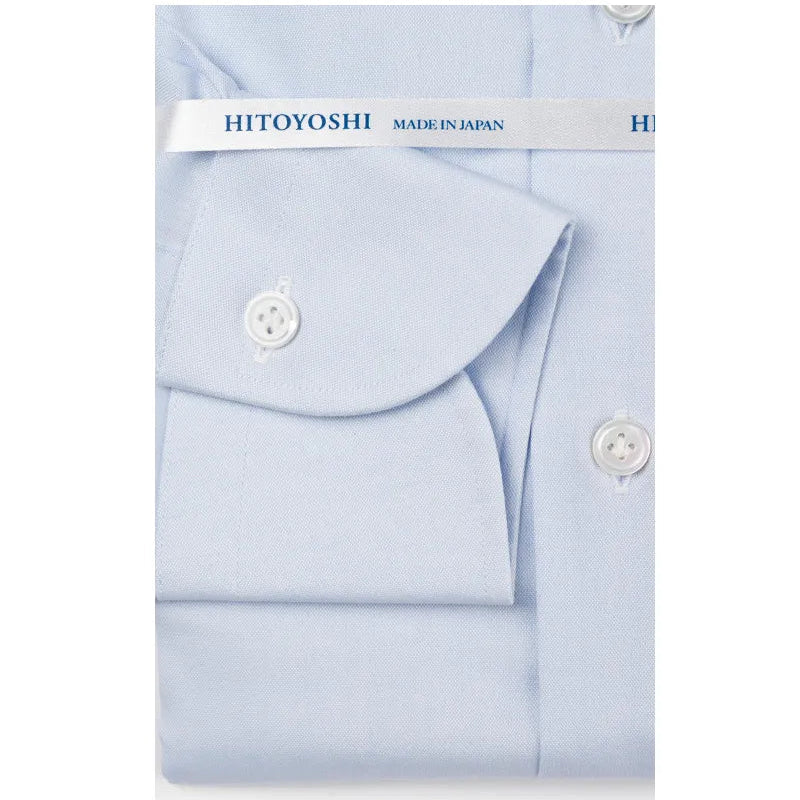 Folded sleeve button detail of the Hitoyoshi Spread Collar Soothing Light Blue shirt