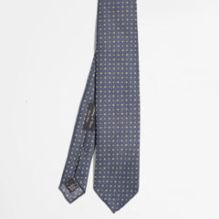Full view of the Holliday & Brown floral tie in navy and brown showing elegant floral pattern and refined proportions.