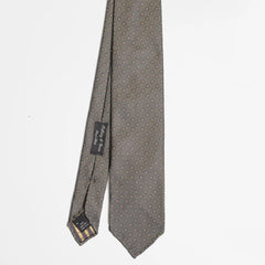 Full view of the Holliday & Brown floral tie in olive and beige showing elegant floral pattern and refined proportions.