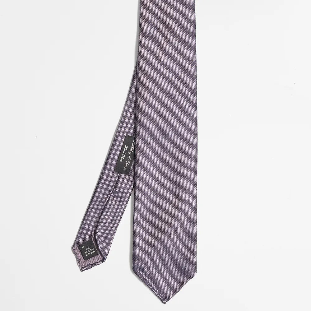 Full view of the Holliday & Brown plain tie in vintage purple showing clean design and refined proportions.