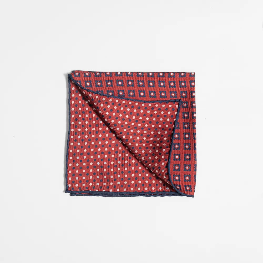 Folded view of the Holliday & Brown pocket square showing pattern placement and finishing detail.