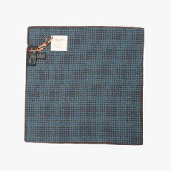 black view of the Holliday & Brown pocket square in blue paisley, showing the full pattern layout, border design, and rich blue tones.