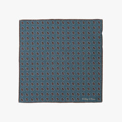 Full view of the Holliday & Brown pocket square in blue paisley, showing the full pattern layout, border design, and rich blue tones.