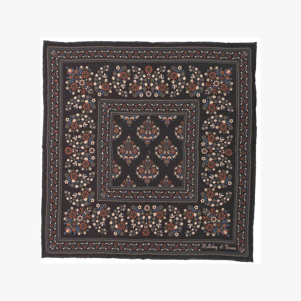 Full view of the Holliday & Brown pocket square in grey, showing the complete paisley motif and balanced border design.