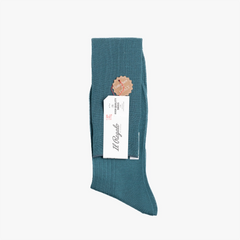Side profile of the Il Regalo 8x2 Rib Over-The-Calf Socks in Green showing rib structure and craftsmanship.