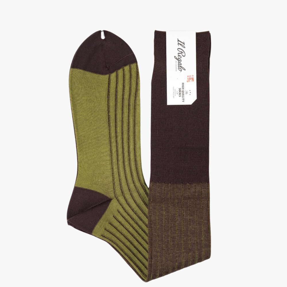 Side view of the Il Regalo Reversible Over The Calf Socks highlighting the rib-knit structure, contrasting heel and toe, and the two-color reversible design.