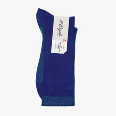 Folded view of the Il Regalo Reversible OTC Socks displaying both Purple and Emerald tones and the reversible rib-knit construction.