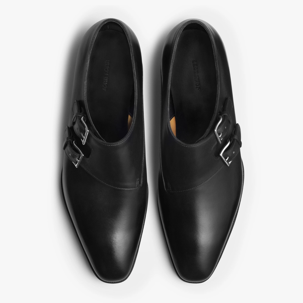 Angled view of the John Lobb Chapel Double Monk in Black showing overall proportions, toe shape, and buckle placement.