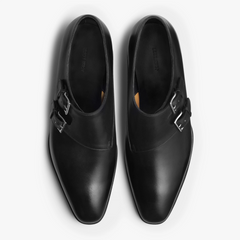 Angled view of the John Lobb Chapel Double Monk in Black showing overall proportions, toe shape, and buckle placement.