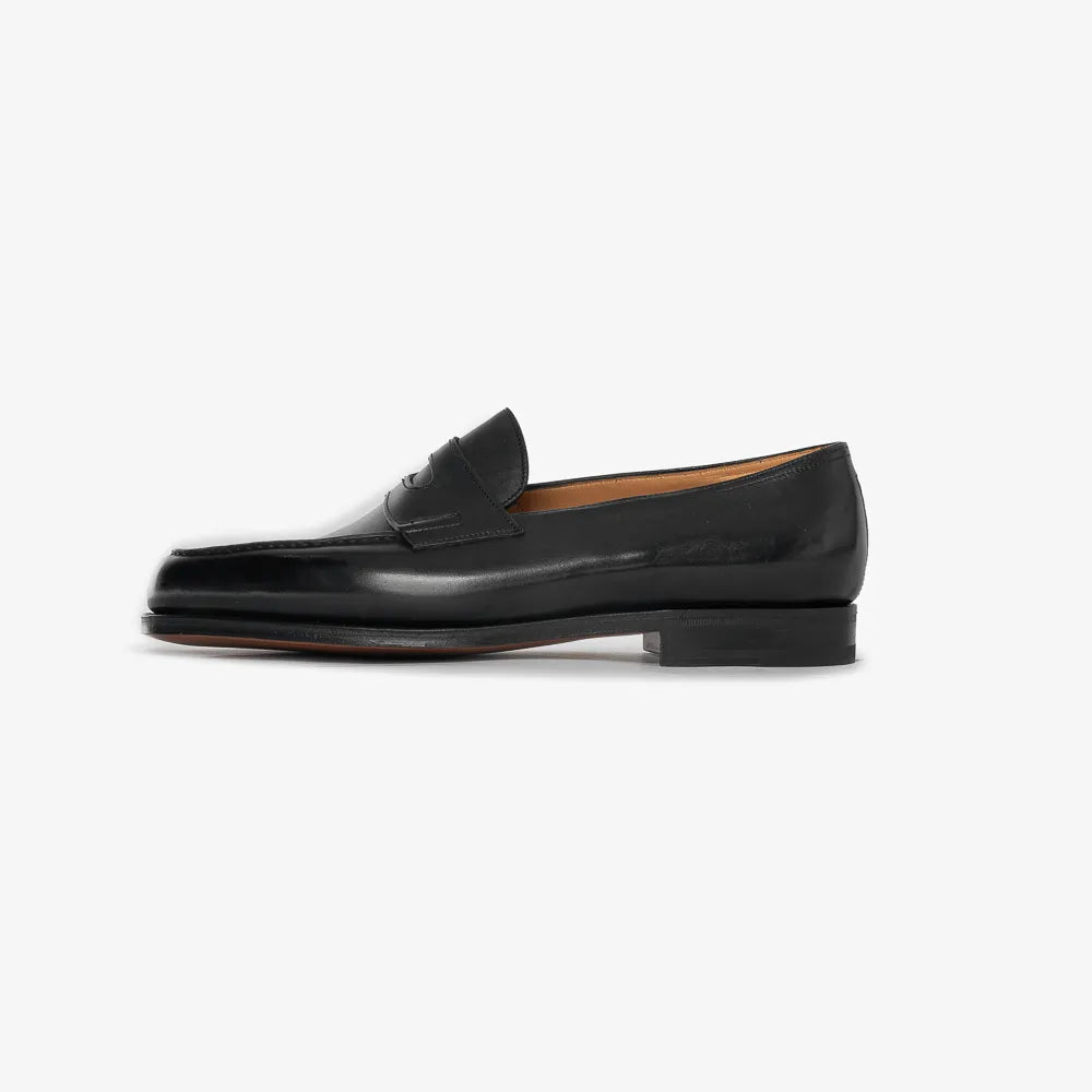 John Lobb Lopez loafer in black calf leather, side profile highlighting sleek silhouette.