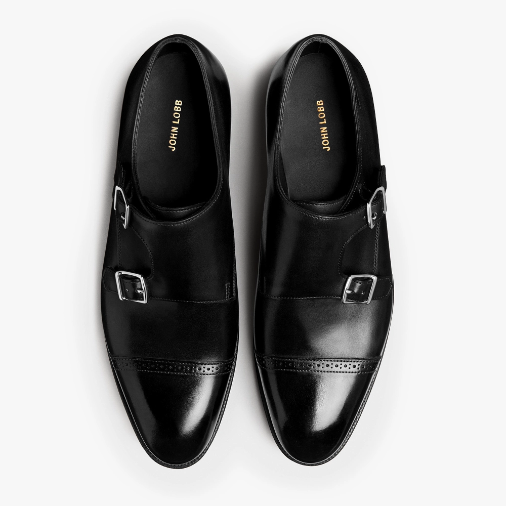 Angled view of the John Lobb Philip II Double Buckle in Black displaying the toe shape, buckle placement, and balanced proportions.