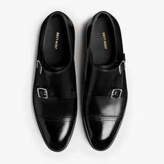 Angled view of the John Lobb Philip II Double Buckle in Black displaying the toe shape, buckle placement, and balanced proportions.