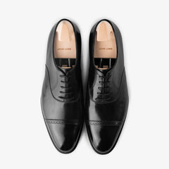 John Lobb Philip II Oxford in black calf leather, top view showing captoe and precise lacing.
