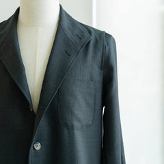 Close-up of the collar and neckline of the Justo Gimeno Teba Jacket Hopsack by VBC Green