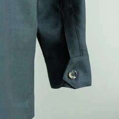 Sleeve and button detail of the Justo Gimeno Teba Jacket Hopsack by VBC Green