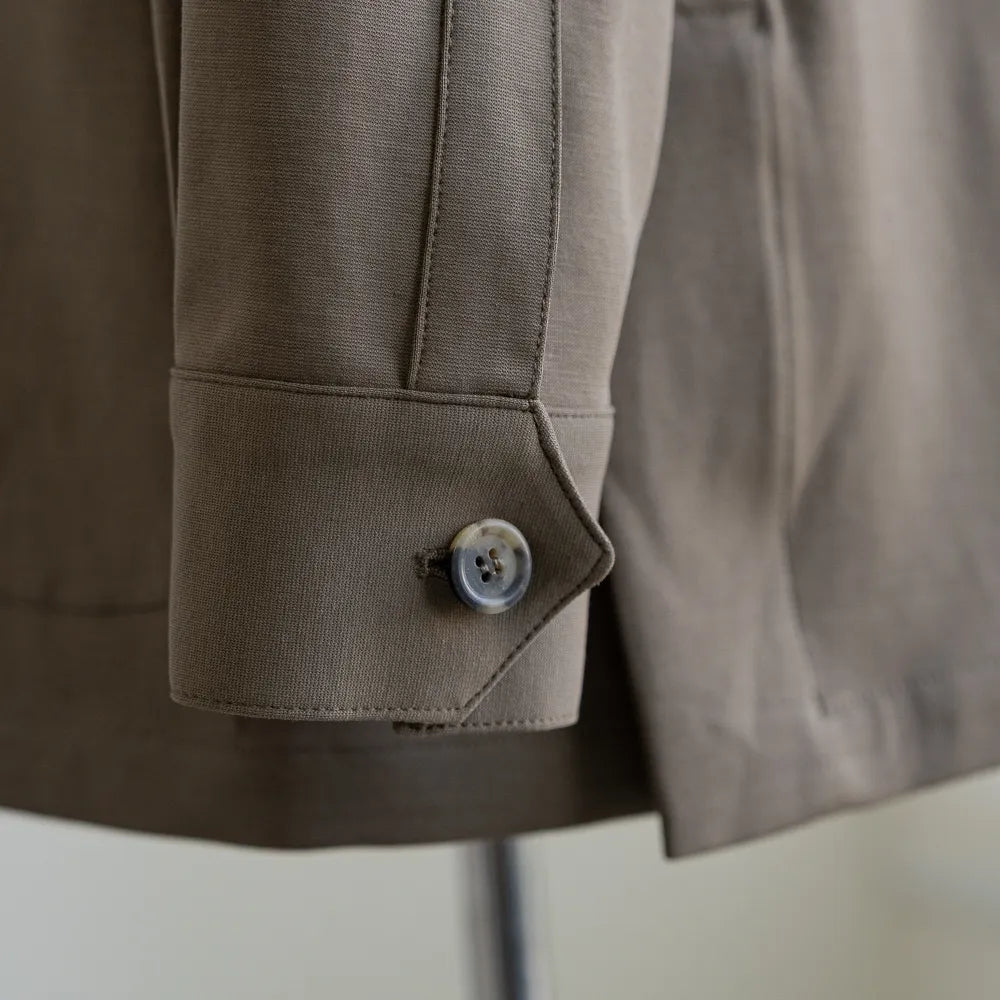 Sleeve and button close-up on the Justo Gimeno Teba Jacket Hopsack by VBC Green