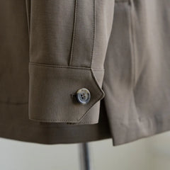 Sleeve and button close-up on the Justo Gimeno Teba Jacket Hopsack by VBC Green
