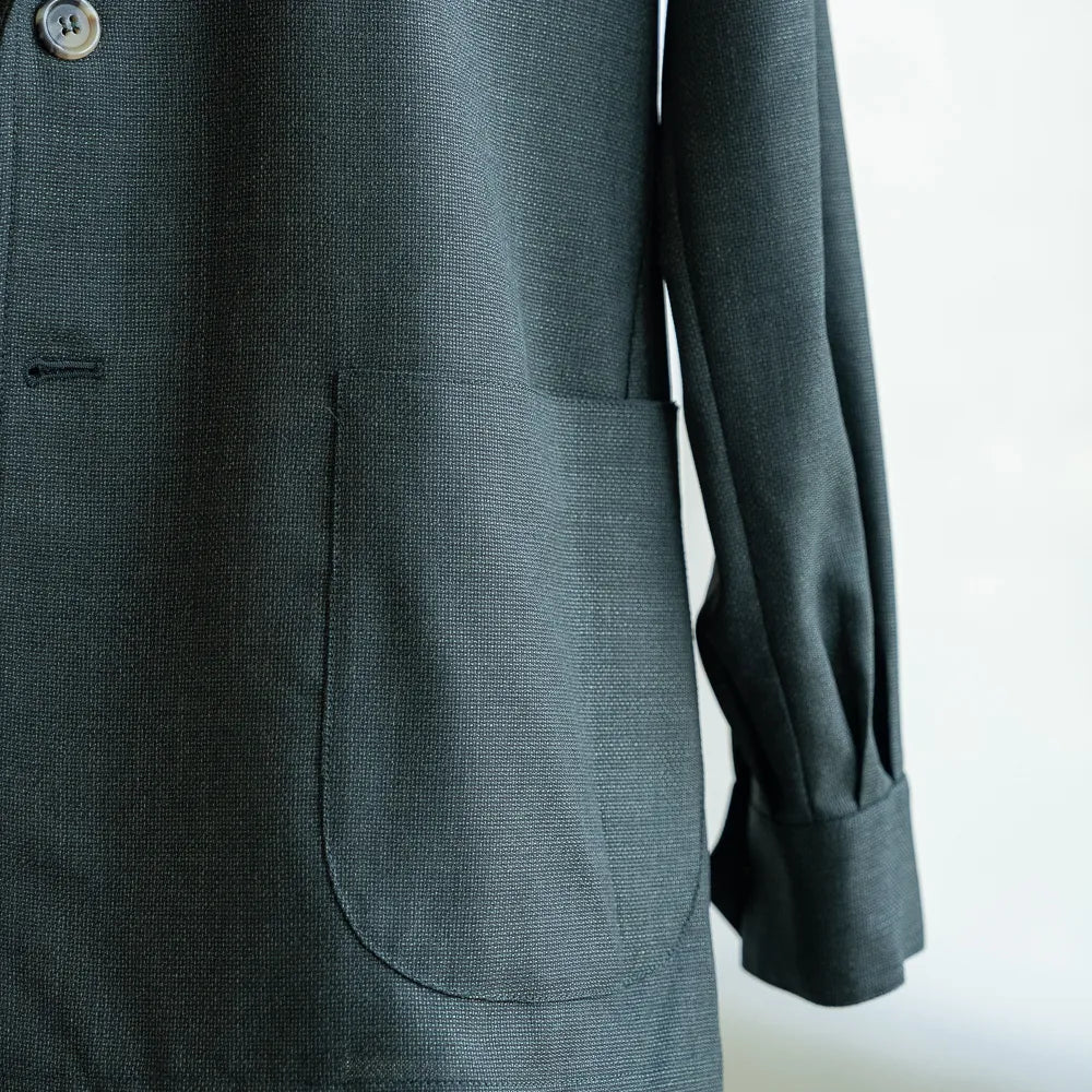 Sleeve detail of the Justo Gimeno Teba Jacket Hopsack by VBC Green