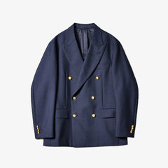 Front view of the Kaptain Sunshine double-breasted blazer in navy featuring a relaxed silhouette and classic tailoring.